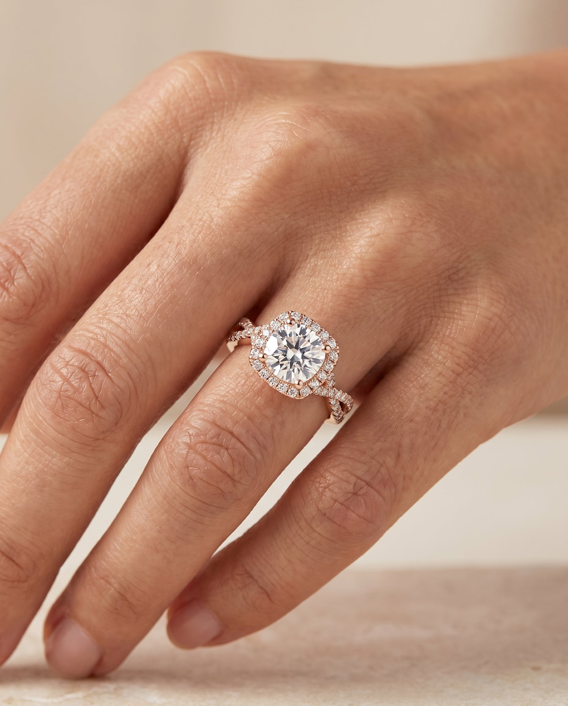 The Shania engagement ring setting in 14K Rose Gold, select beaded floral halo leaf shoulders design | RockHer