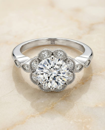 Round Brilliant, Beaded Floral Halo Leaf Shoulders, in Platinum, pave setting – angled view | RockHer