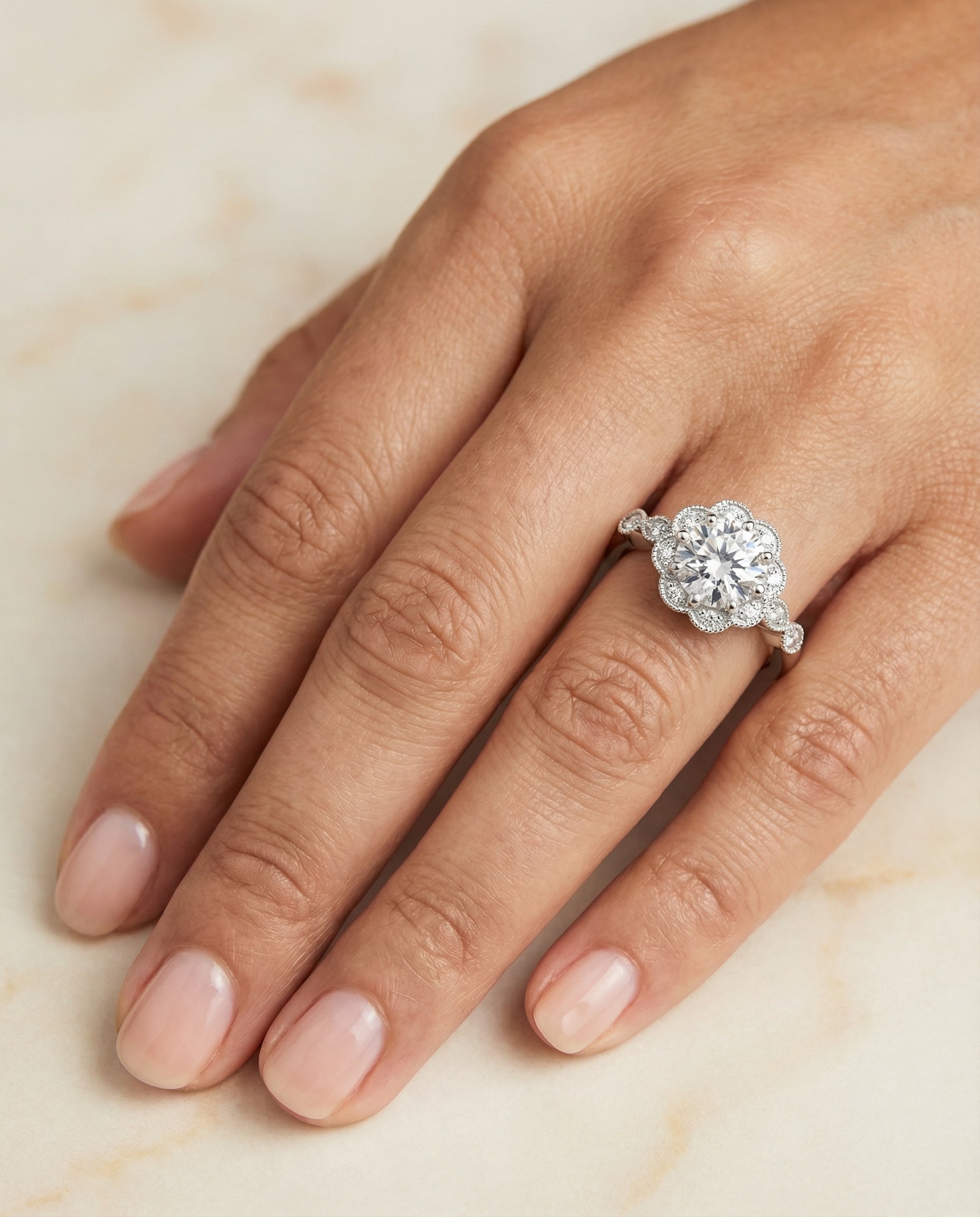 The Shania engagement ring setting in Platinum, beaded floral halo leaf shoulders design | RockHer