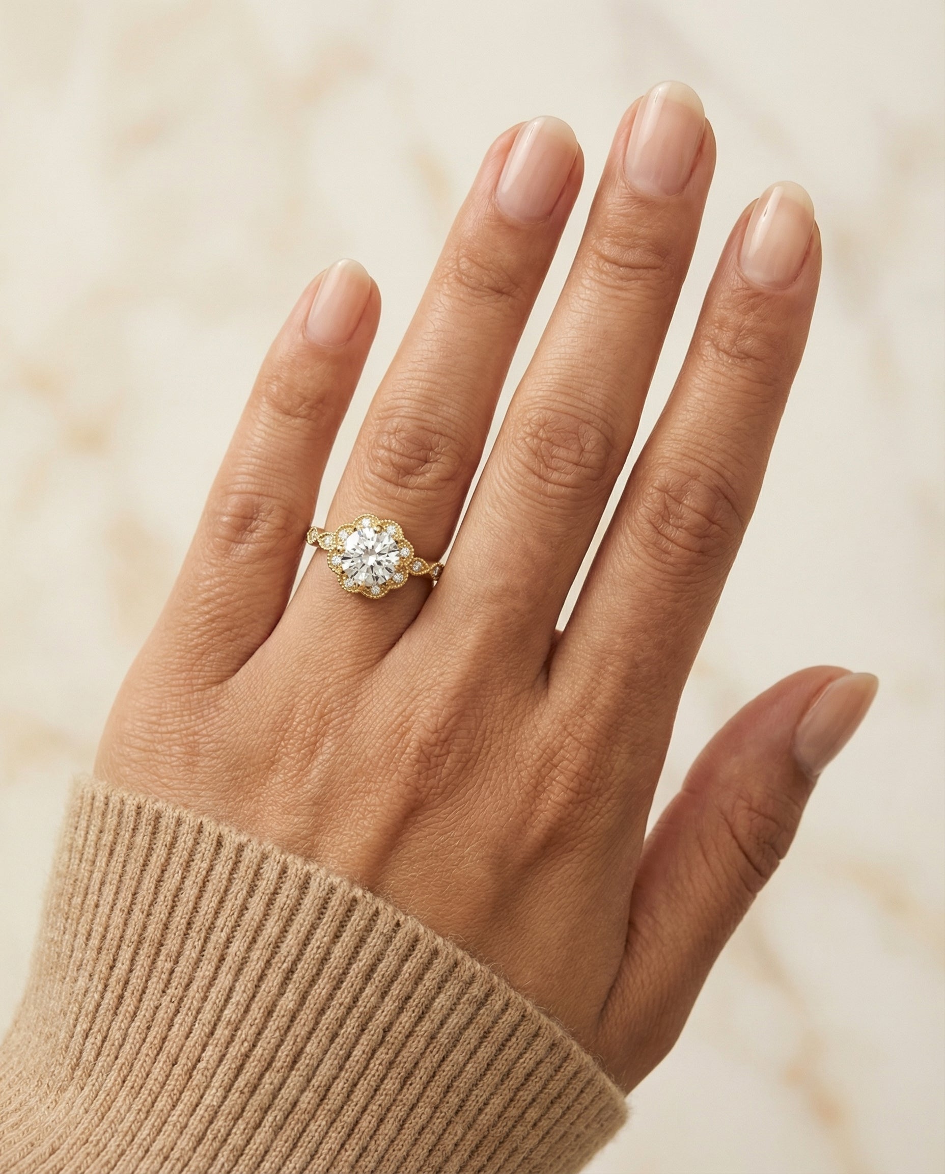 The Shania engagement ring setting in 18K Yellow Gold, select beaded floral halo leaf shoulders design | RockHer