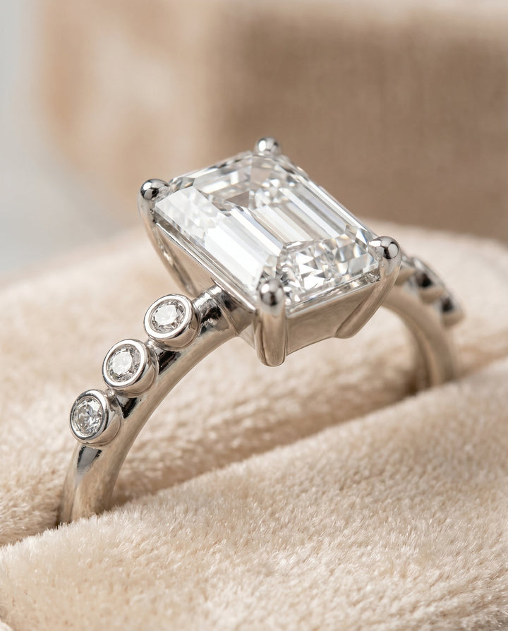 The Peggy Select Bezel Accent Solitaire Emerald Cut Engagement Ring with Lab Diamond in 18K White Gold — view 4