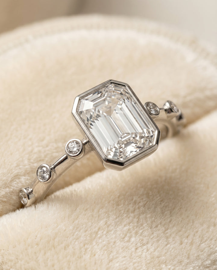 The Brandi Bezel Solitaire Engagement Ring Setting for Emerald Cut Diamonds in Platinum