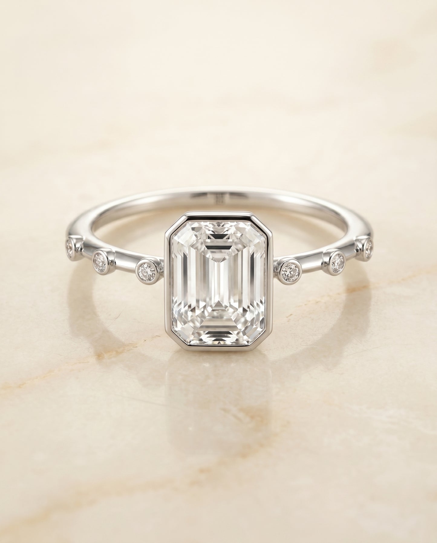 The Brandi Bezel Solitaire Engagement Ring Setting for Emerald Cut Diamonds in 18K White Gold | RockHer