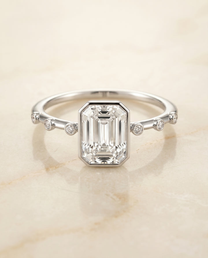 The Brandi Bezel Solitaire Engagement Ring Setting for Emerald Cut Diamonds in 18K White Gold | RockHer
