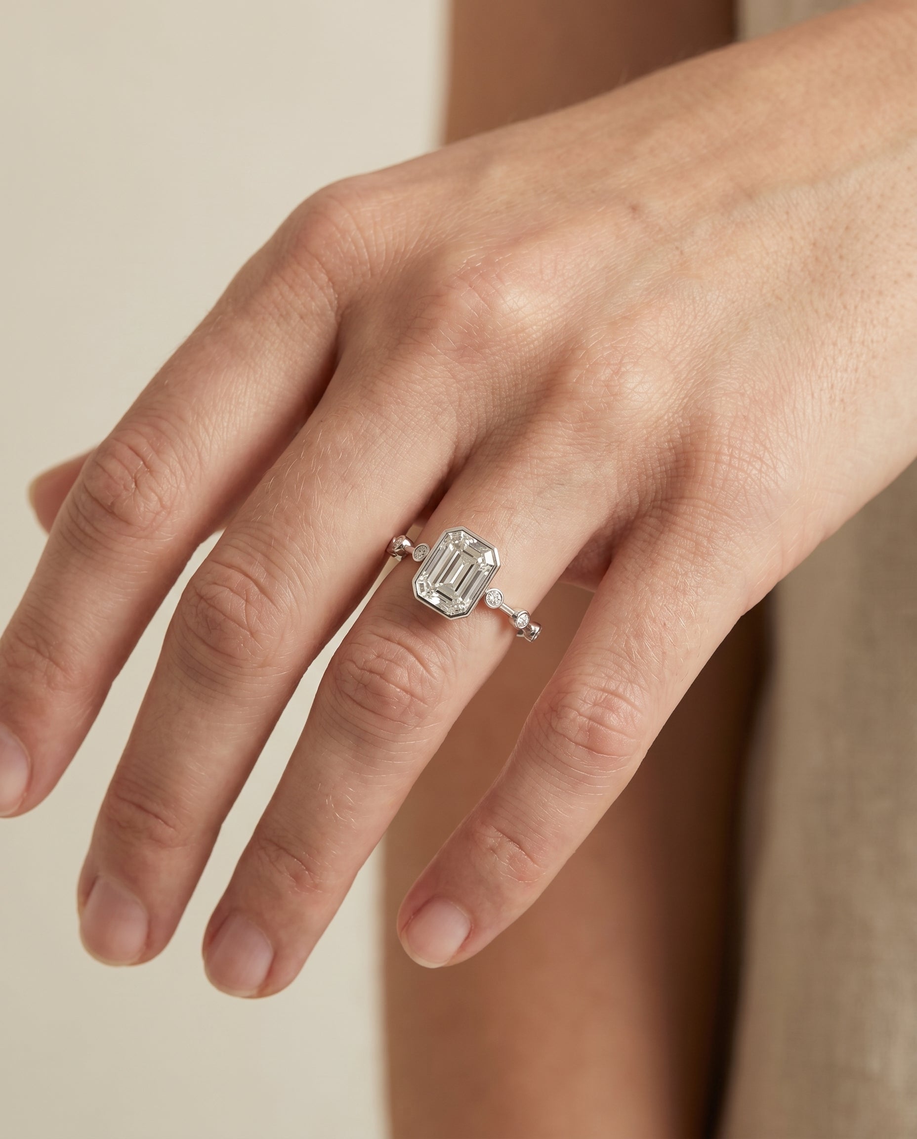 The Brandi engagement ring setting in Platinum, bezel accent solitaire cut design | RockHer