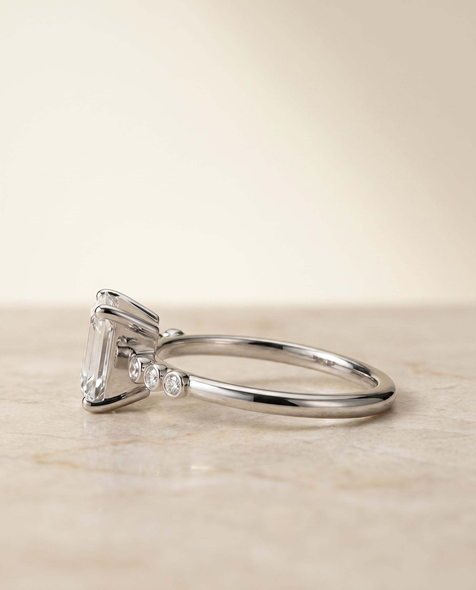 The Peggy setting for emerald diamonds, made to order in Platinum | RockHer