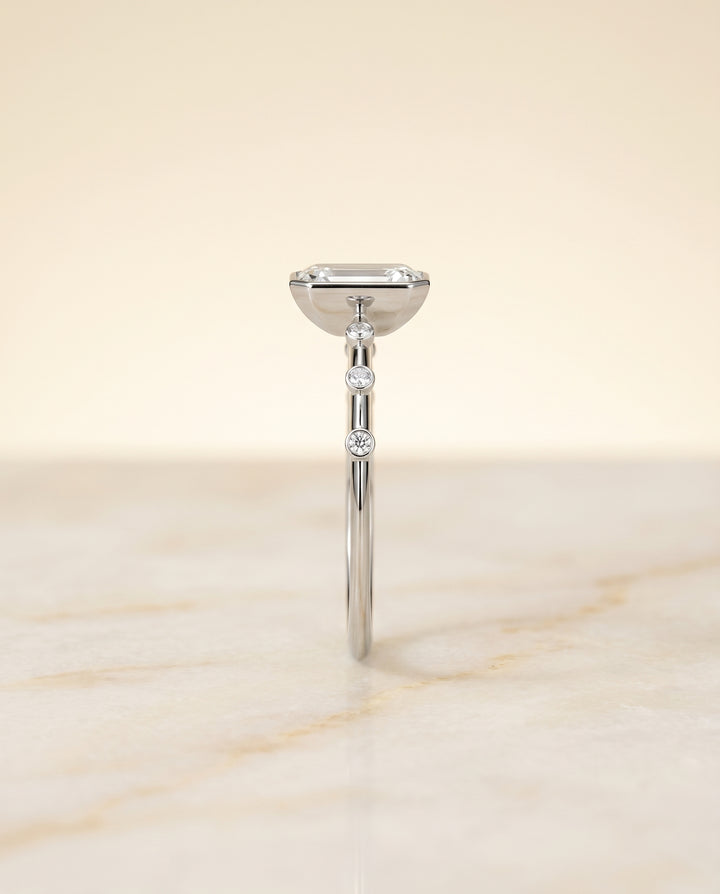 The Brandi Bezel Solitaire Engagement Ring Setting for Emerald Cut Diamonds in Platinum