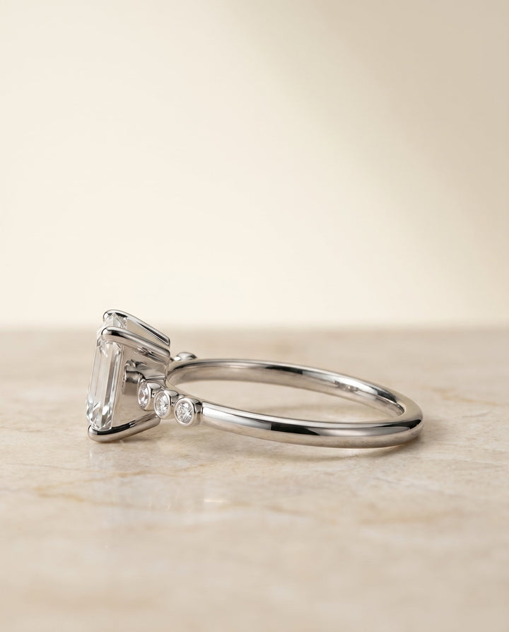 The Peggy Select Bezel Accent Solitaire Emerald Cut Engagement Ring with Lab Diamond in 18K White Gold — view 5