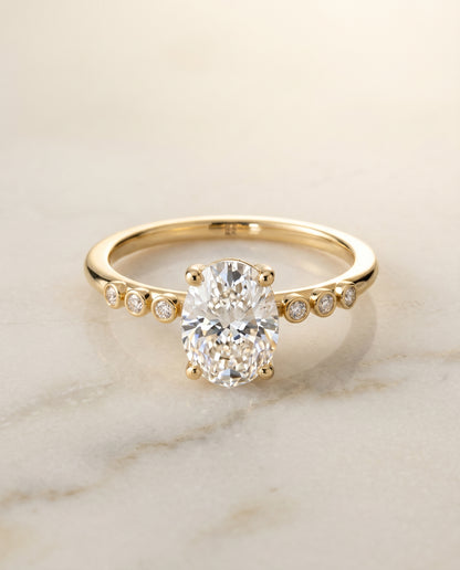 The Peggy Bezel Solitaire Engagement Ring Setting for Oval Diamonds in 18K Yellow Gold | RockHer