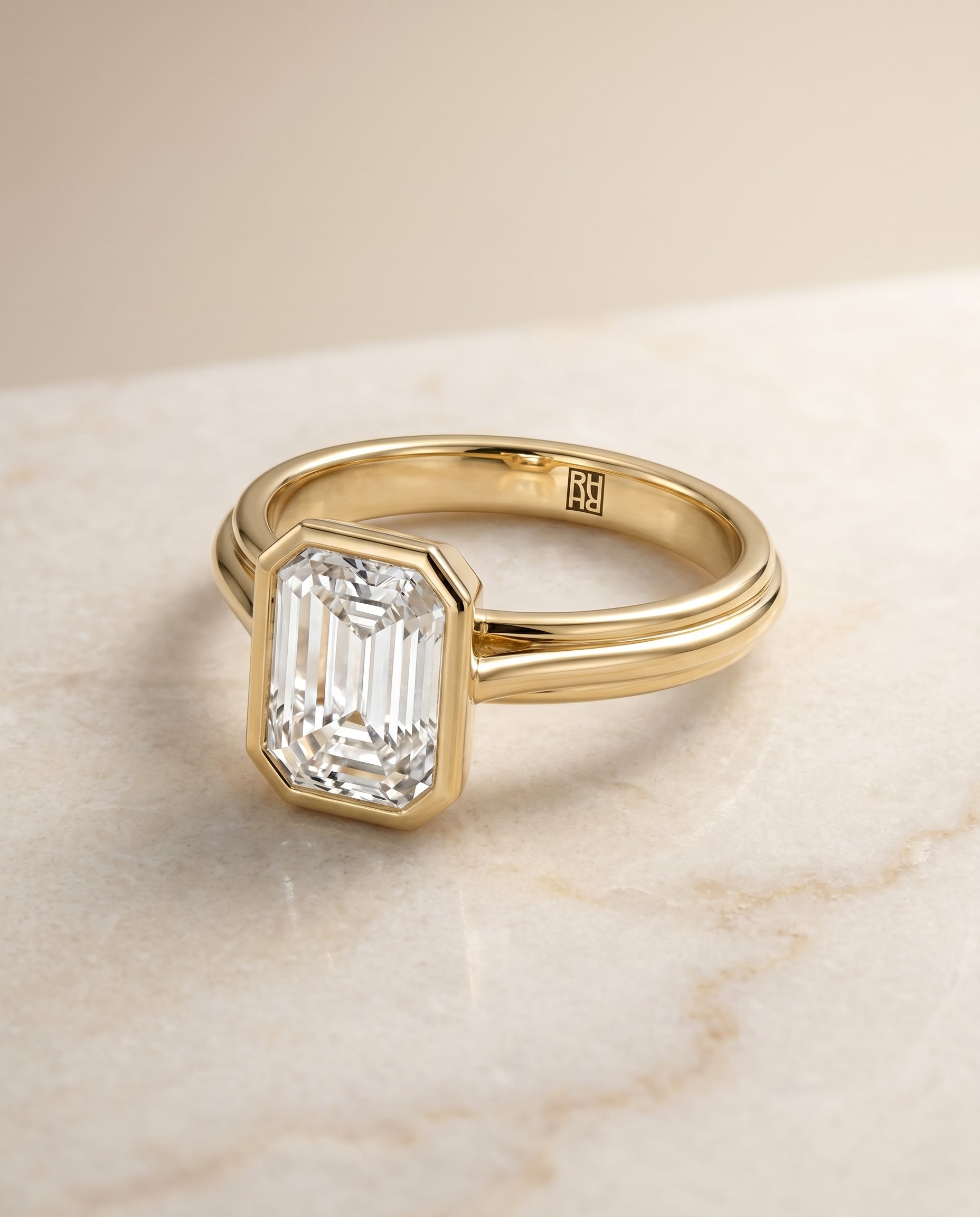 Hayley Select Bezel Cathedral Solitaire Emerald Cut in 14K Yellow Gold – view 1