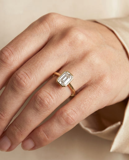 European Cut, Bezel Cathedral Solitaire Emerald, in 18K Yellow Gold – lifestyle shot | RockHer