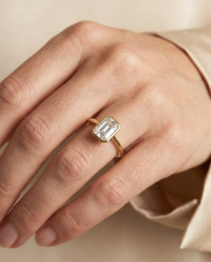 Hayley bezel cathedral solitaire engagement ring in 18K yellow gold with emerald lab diamond — RockHer