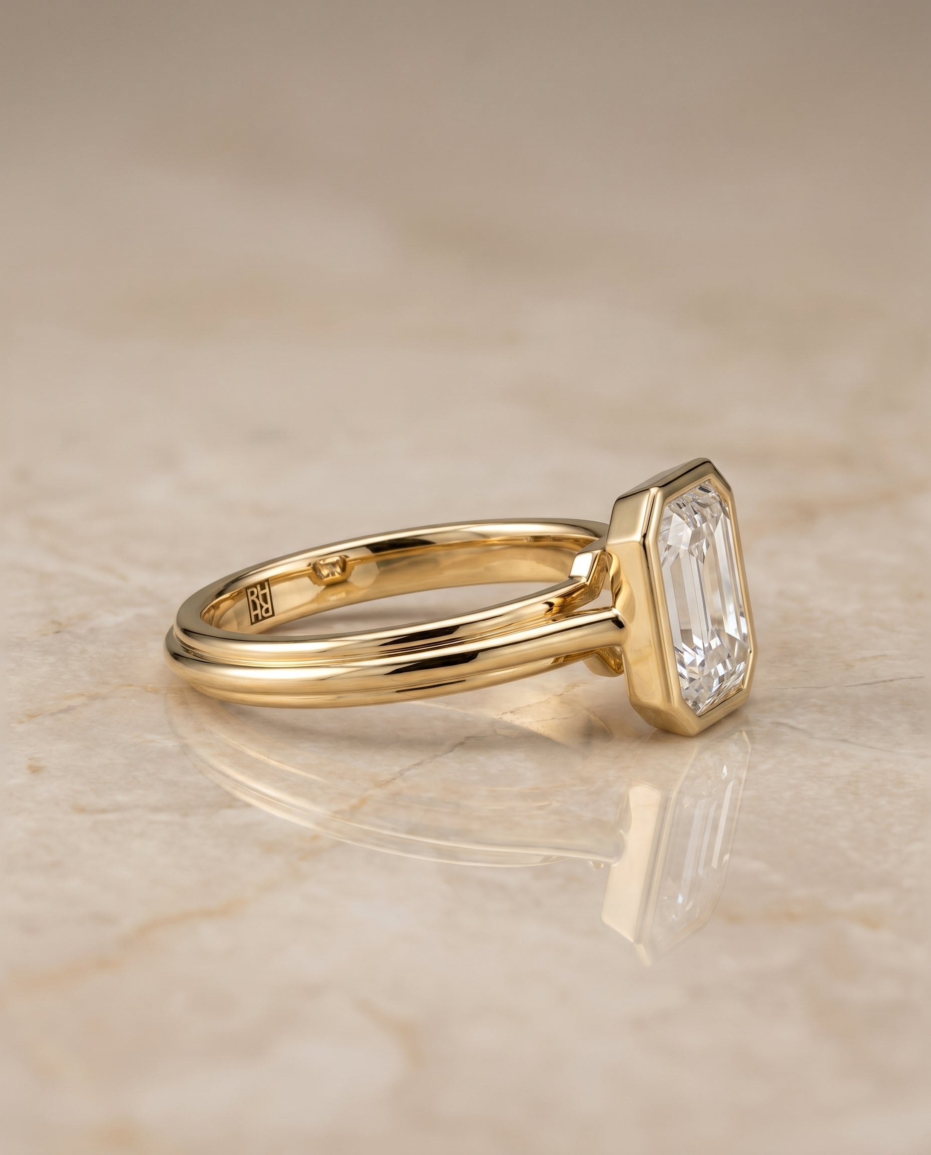 The Hayley bezel cathedral solitaire cut engagement ring setting, shown in 18K Yellow Gold | RockHer