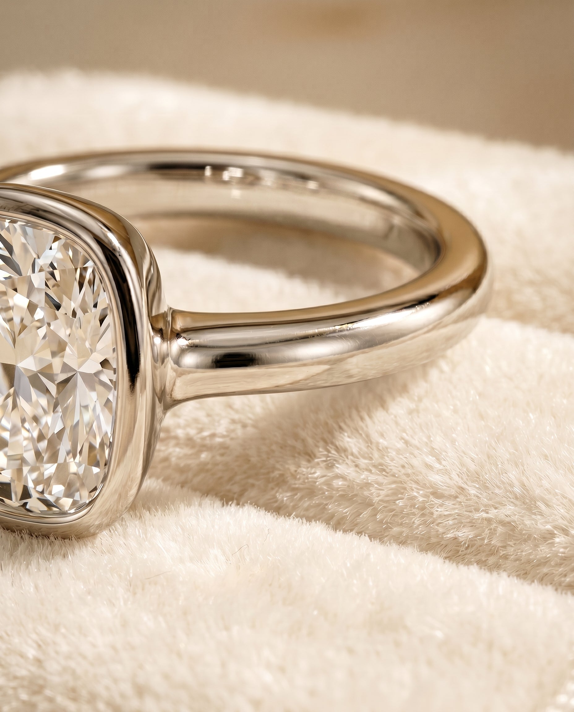 Platinum band of The Agnes cushion engagement ring setting | RockHer