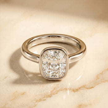 The Agnes Bezel Solitaire In Cushion Cut Engagement Ring Setting in Platinum