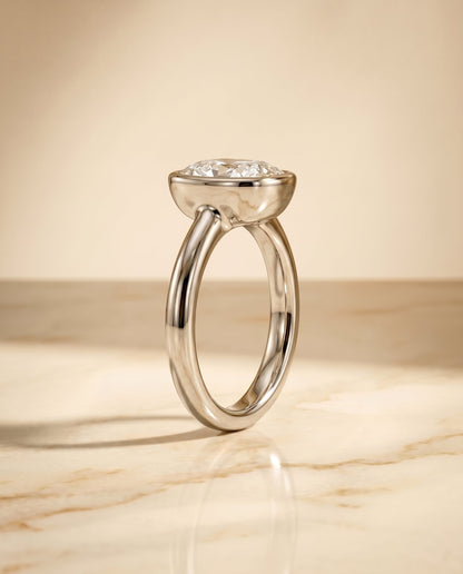Agnes Select Bezel Solitaire In Cushion Cut Lab Diamond Engagement Ring in 18K White Gold, side view | RockHer
