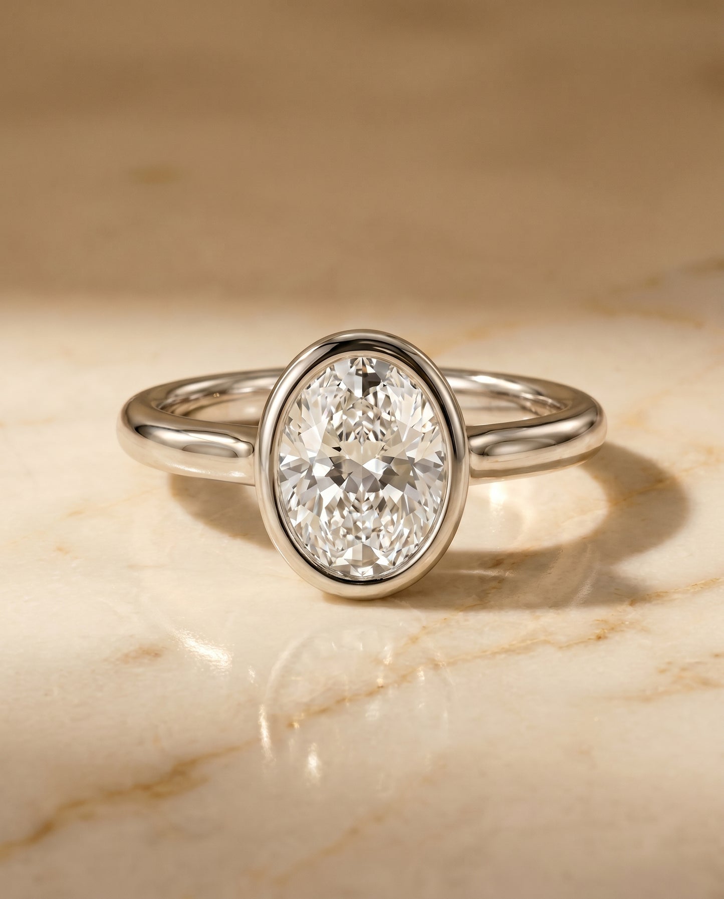 The Agnes Bezel Solitaire Engagement Ring Setting for Oval Diamonds in Platinum | RockHer