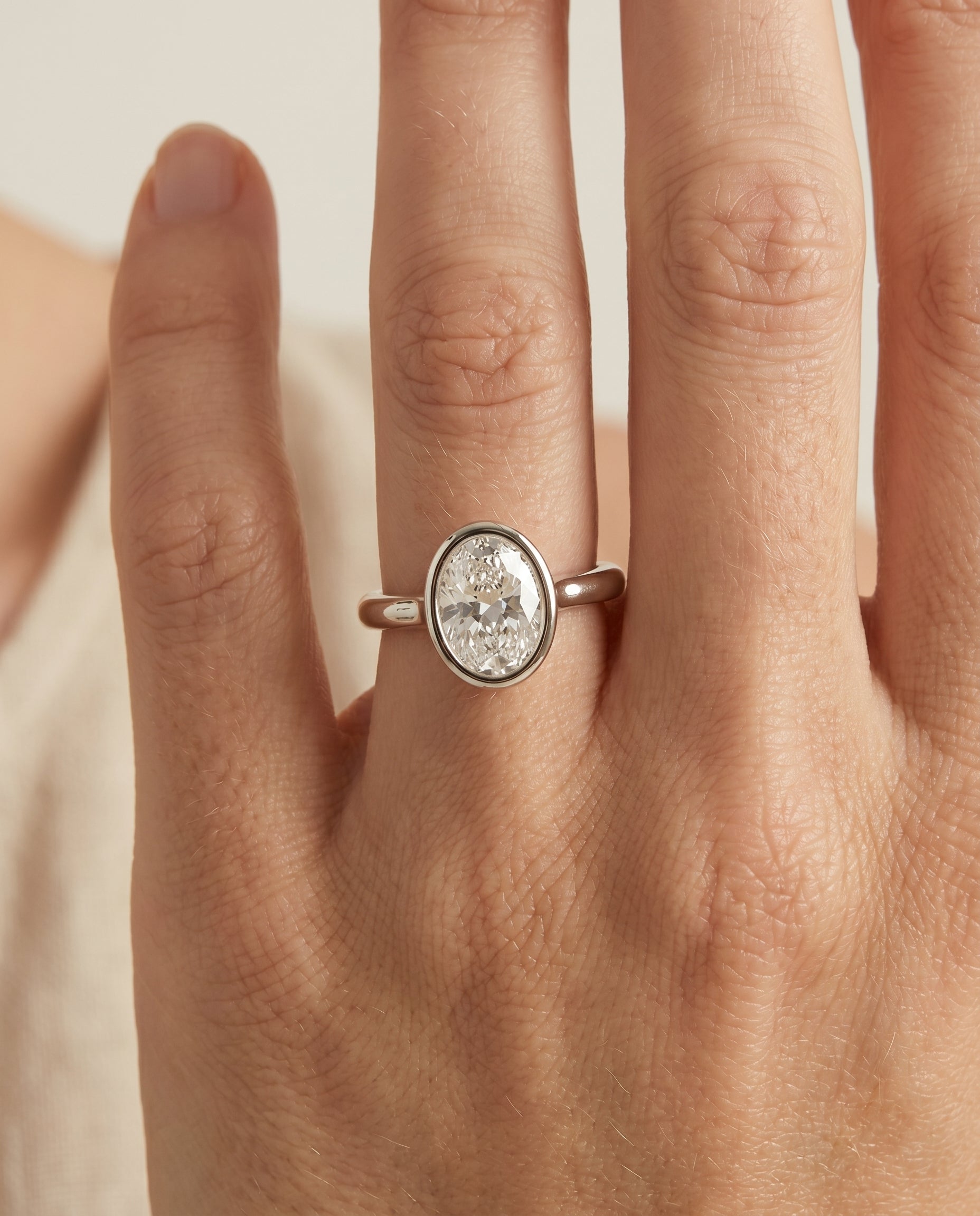 The Agnes engagement ring setting in Platinum, bezel solitaire in design | RockHer