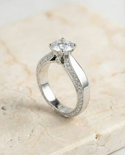 Iola Select bold solitaire secret side pavé round ring in 14K White Gold — side — RockHer
