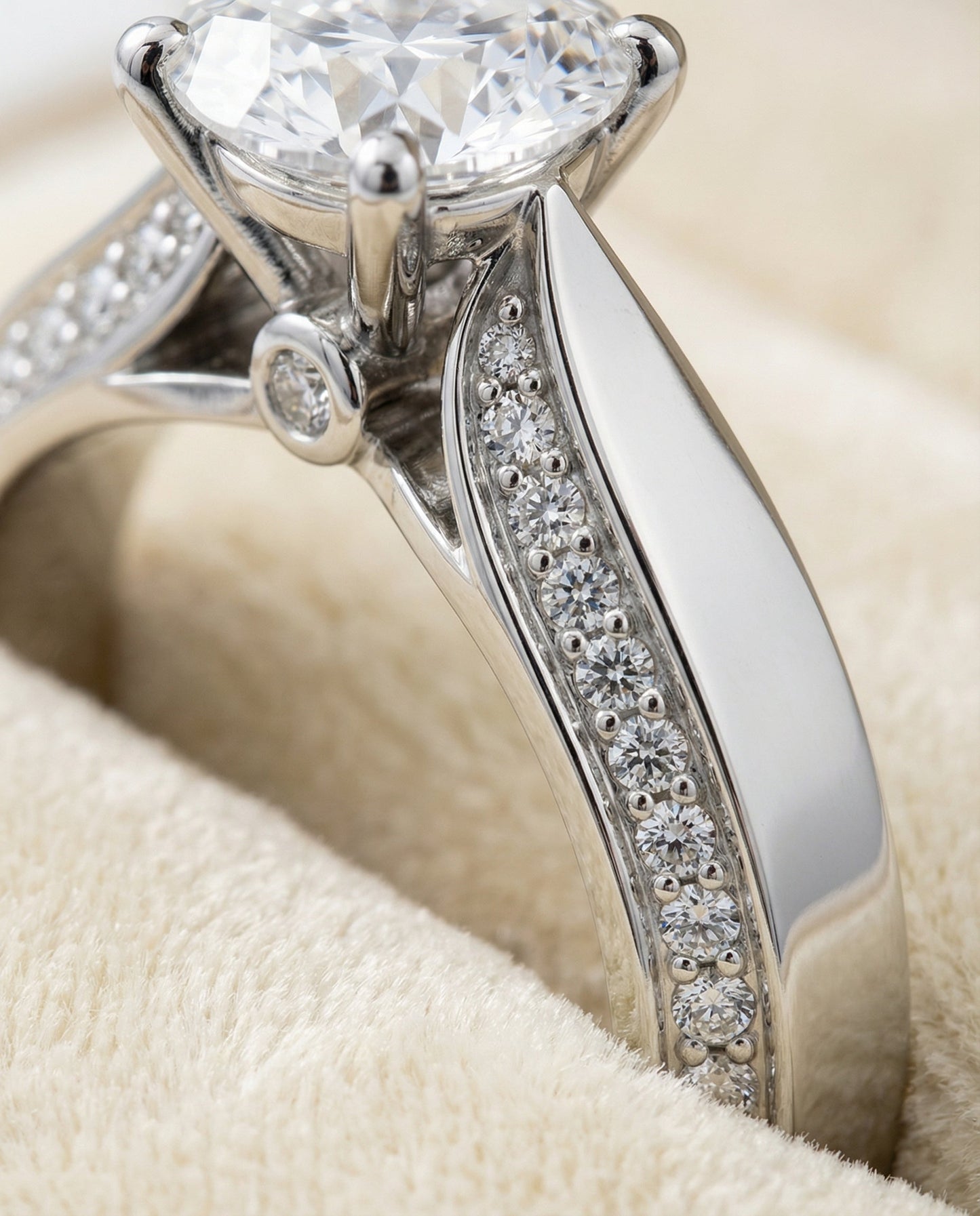 Iola Select bold solitaire secret side pavé round ring in 14K White Gold — side — RockHer