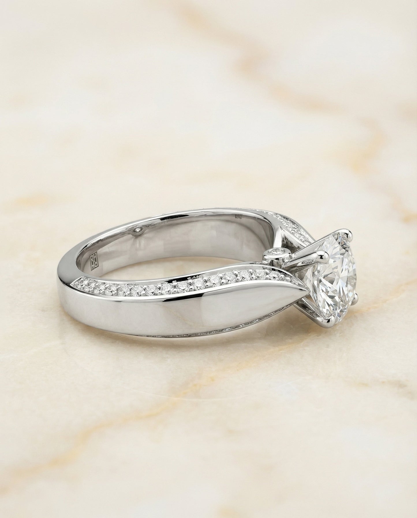 Iola Select bold solitaire secret side pavé round ring in 14K White Gold — side — RockHer
