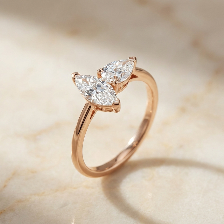 14K Rose Gold Brandy Toi et Moi Select Marquise & Pear Lab Diamond Engagement Ring - Alt angle on warm marble