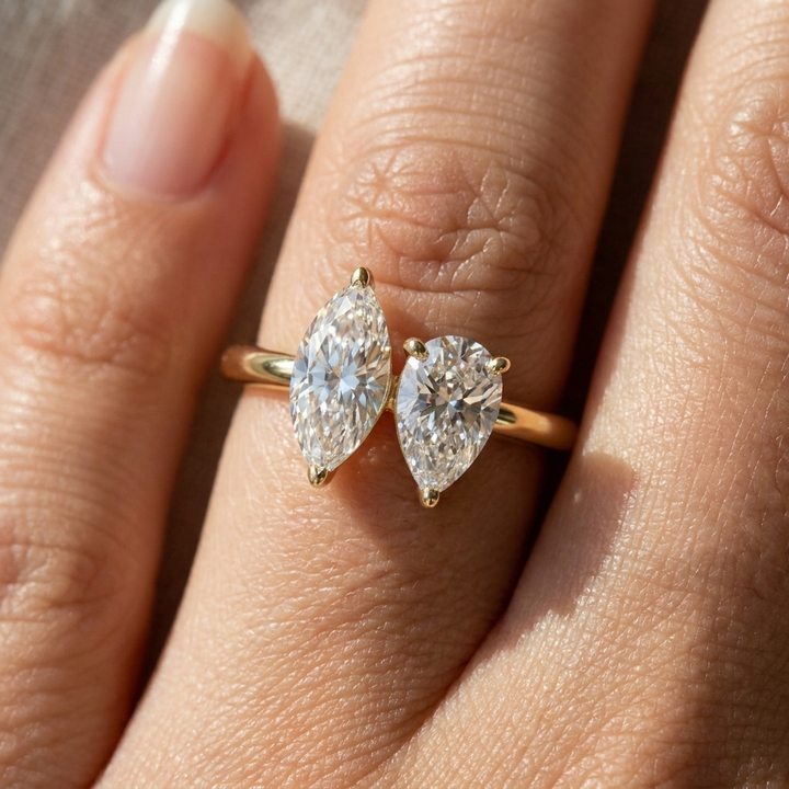 14K Yellow Gold Brandy Toi et Moi Select Marquise & Pear Lab Diamond Engagement Ring - Macro close-up on finger