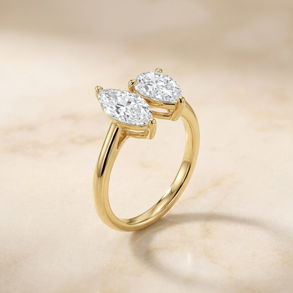 18K Yellow Gold Brandy Toi et Moi Select Marquise & Pear Lab Diamond Engagement Ring - Alt angle on warm marble