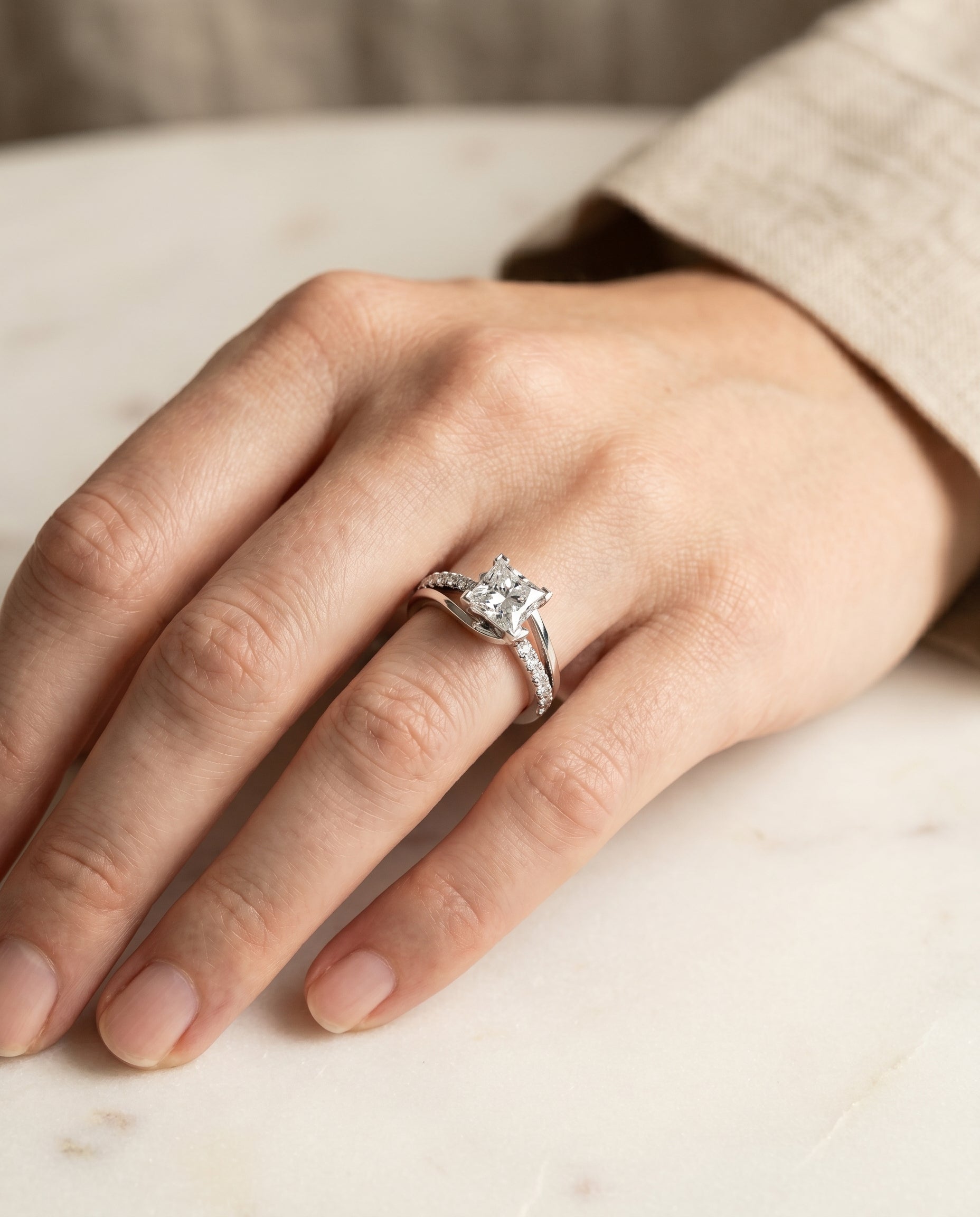 The Tatyana engagement ring setting in 18K White Gold, bypass pavé swirl design | RockHer