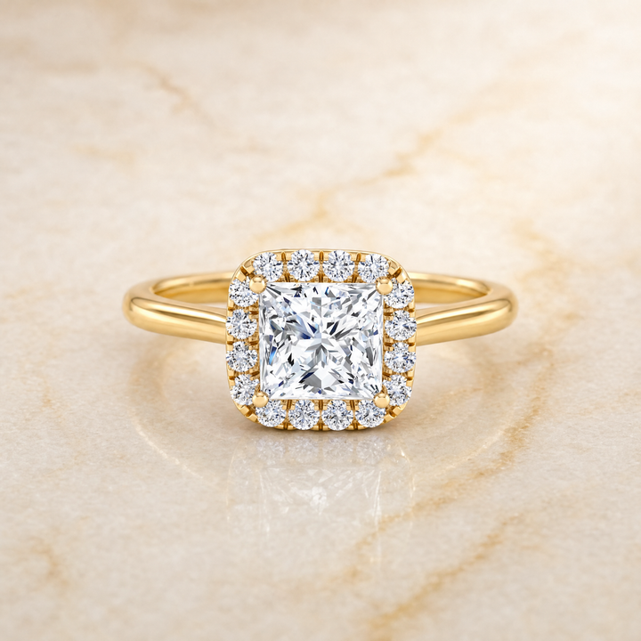 The Carnie Classic Prong Diamond Halo Princess Cut Engagement Ring Setting in 18K Yellow Gold