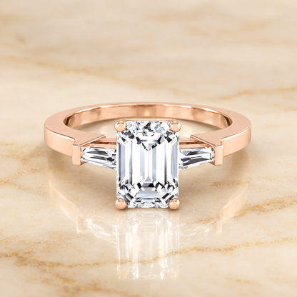 The June Three Stone Emerald Cut Engagement Ring Setting in 14K Rose Gold