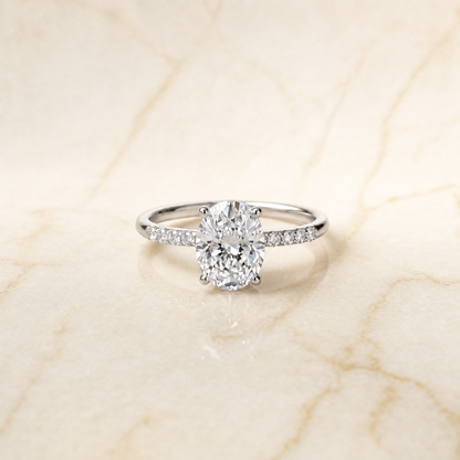 The Cherie Hidden Halo Pavé Solitaire Oval Engagement Ring Setting in Platinum