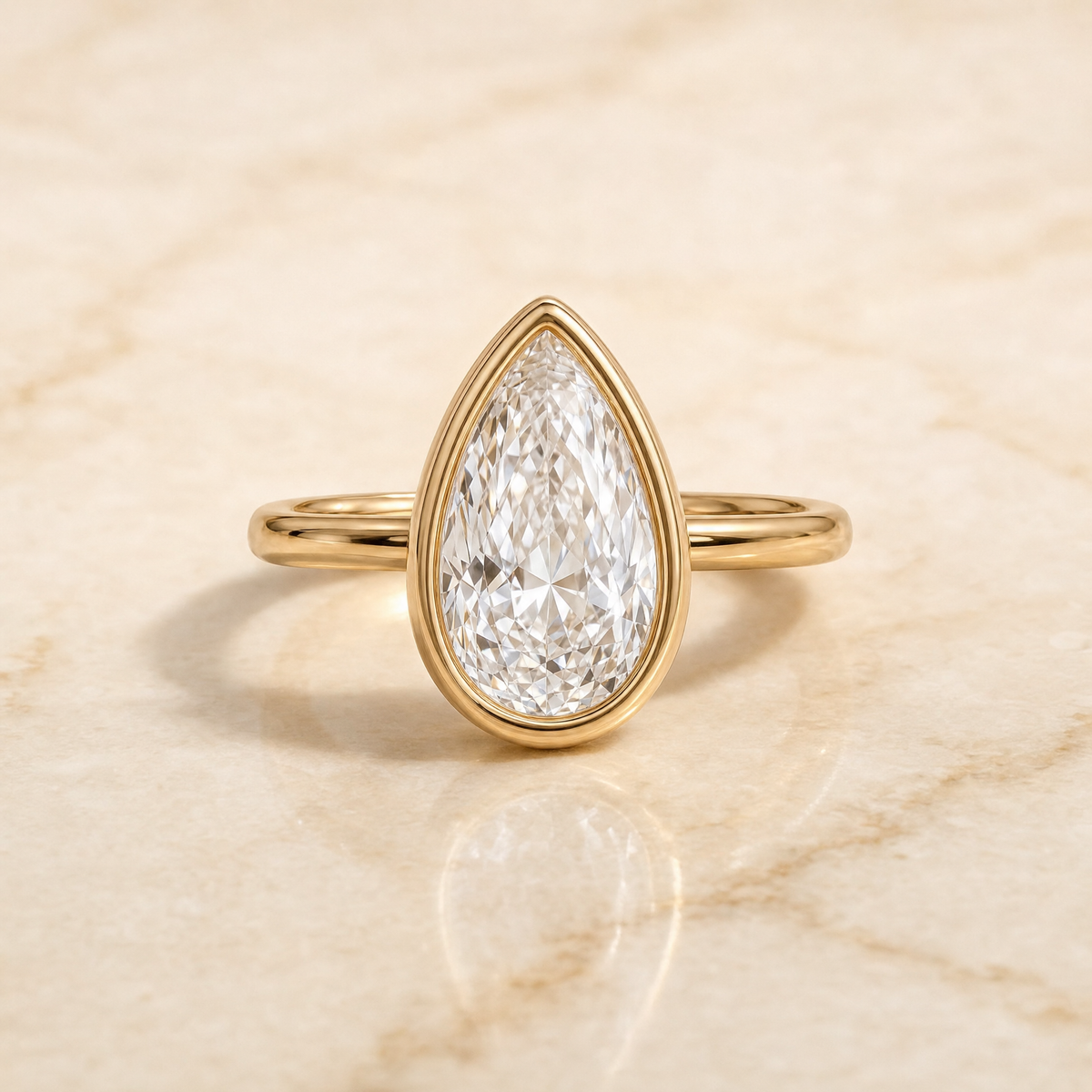 The Agnes Bezel Solitaire In Briolette Engagement Ring Setting in 18K Yellow Gold