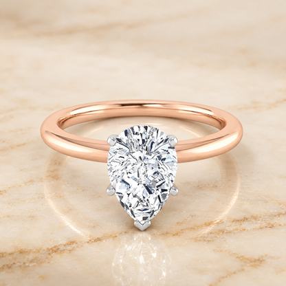 The Floria Comfort Fit Claw Prong Solitaire Pear Engagement Ring Setting in 14K Rose Gold