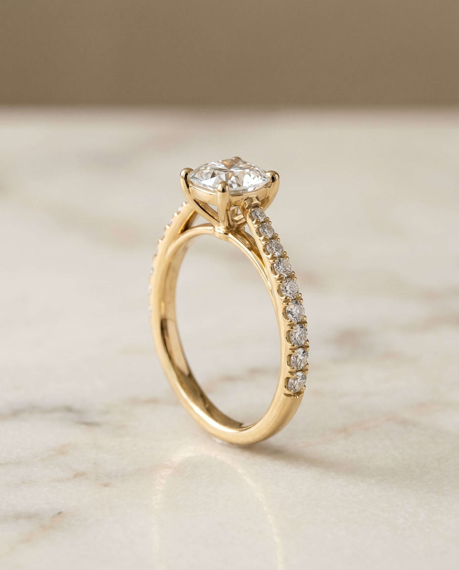 Donna Select Cathedral French Pavé Solitaire Cushion Cut Lab Diamond Engagement Ring in 18K Yellow Gold, front view | RockHer