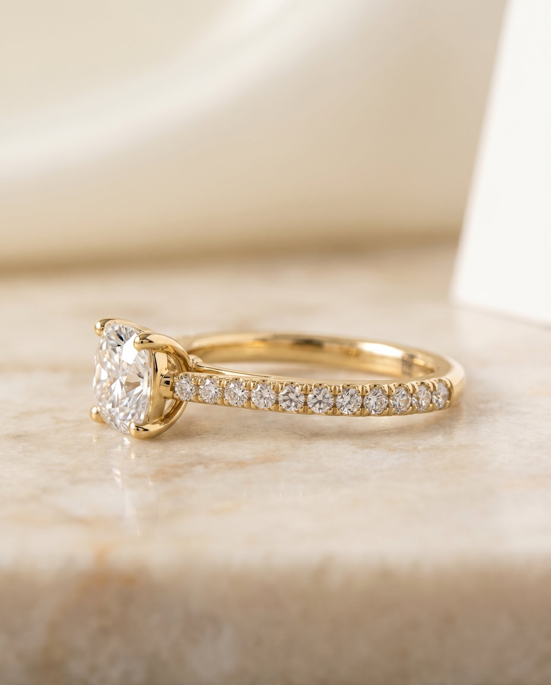 The Donna cathedral french pavé solitaire cut engagement ring setting, shown in 18K Yellow Gold | RockHer