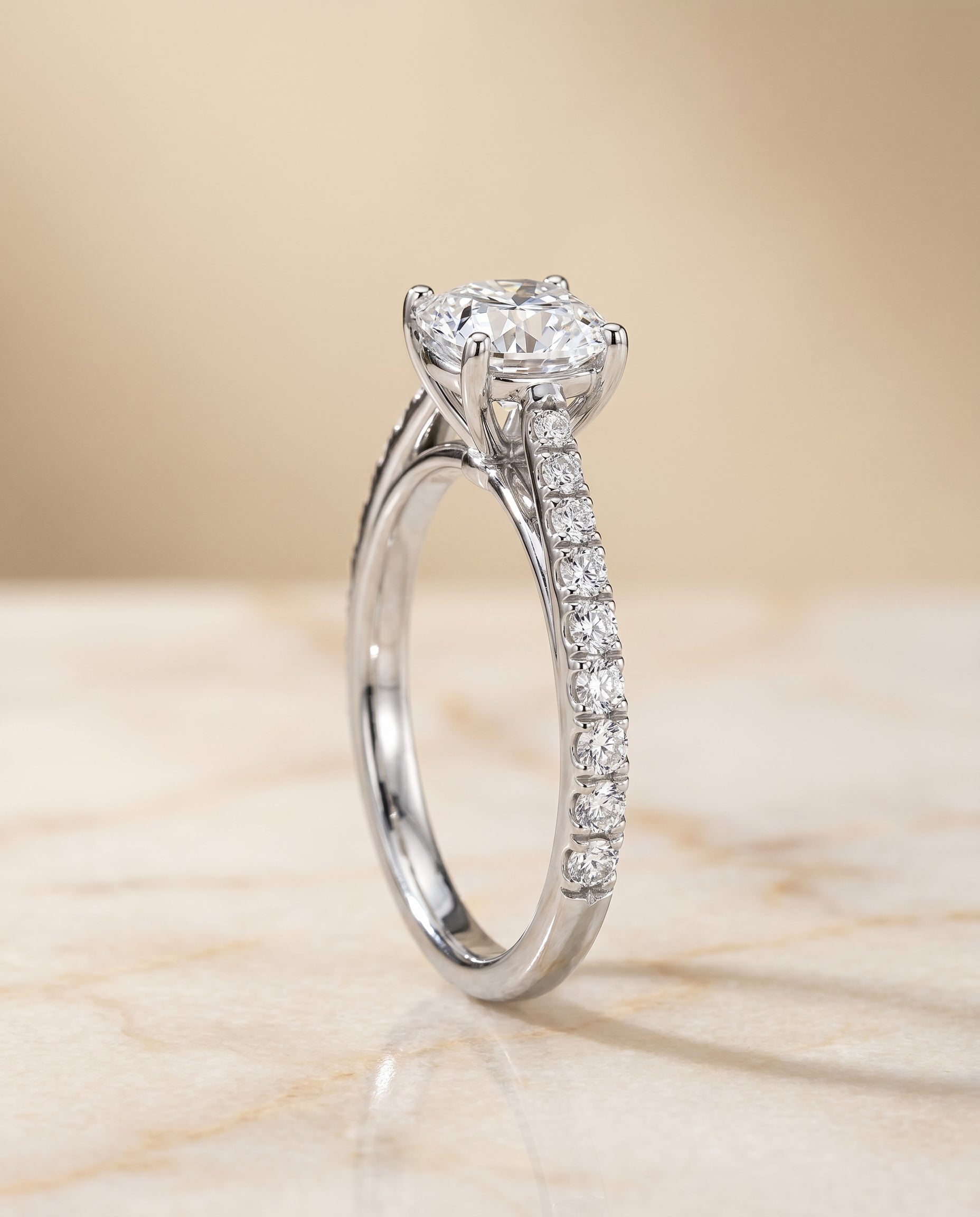 The Donna cathedral french pavé solitaire cut engagement ring setting, shown in Platinum | RockHer