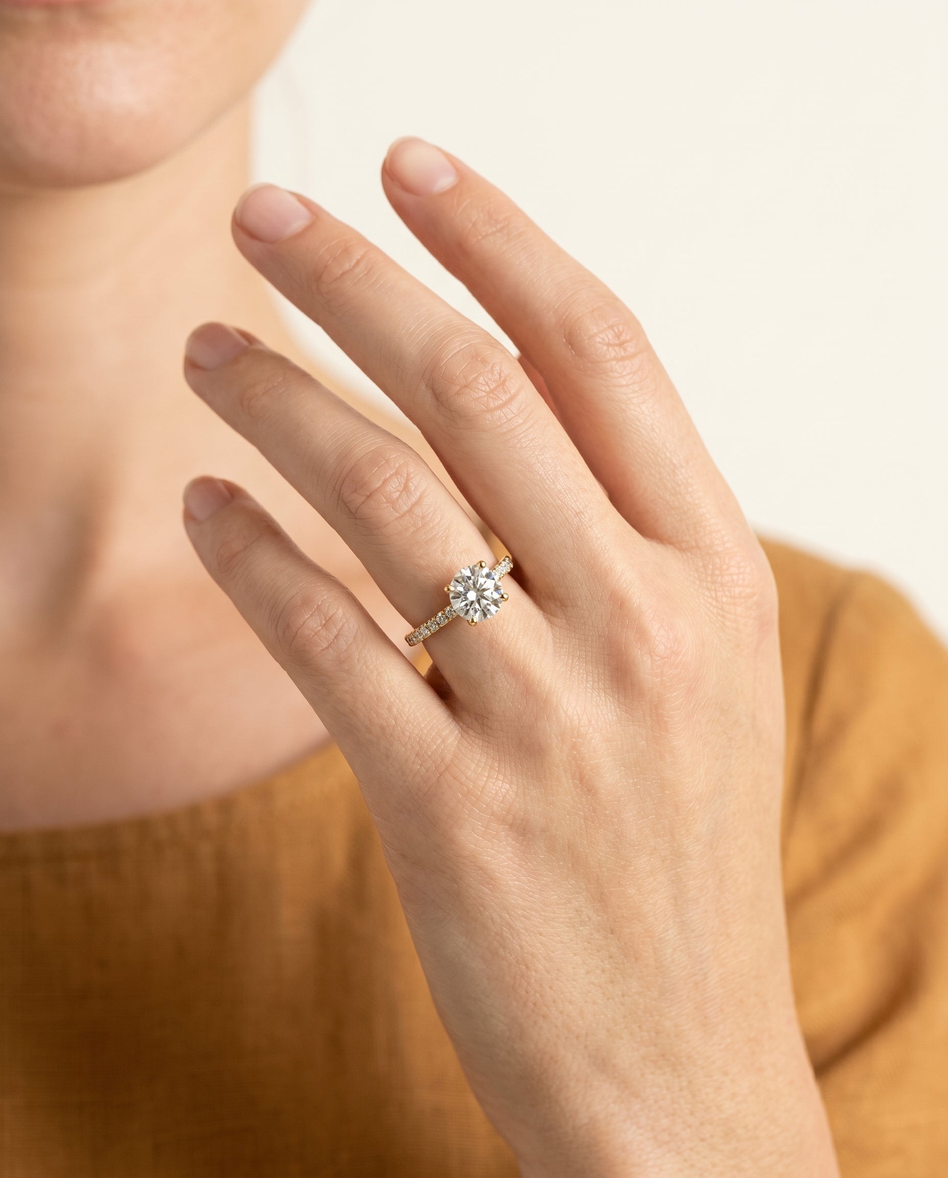 The Donna engagement ring setting in 18K Yellow Gold, cathedral french pavé solitaire design | RockHer