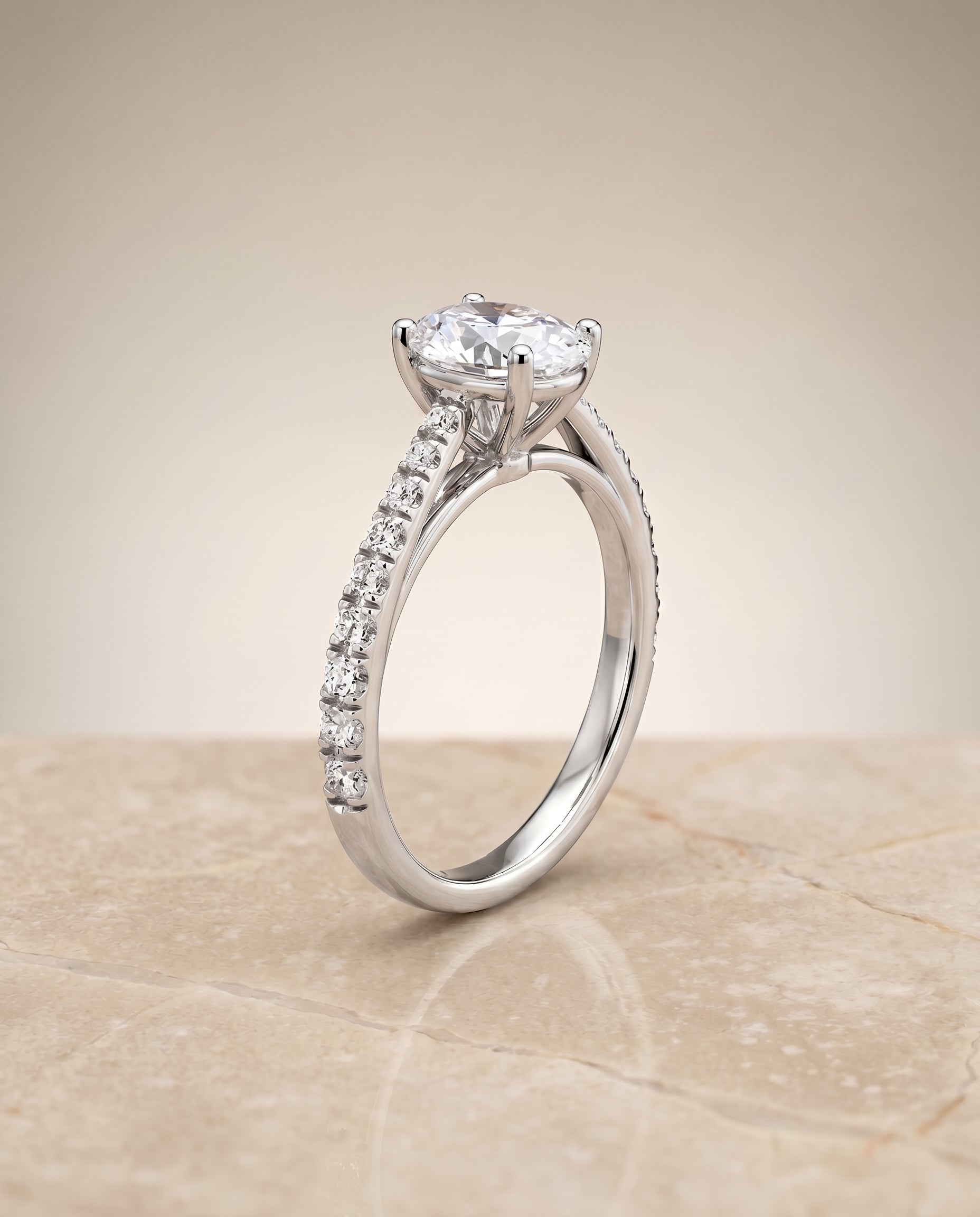 Donna Select Cathedral French Pavé Solitaire Oval Lab Diamond Engagement Ring in Platinum, shown on hand, angled | RockHer