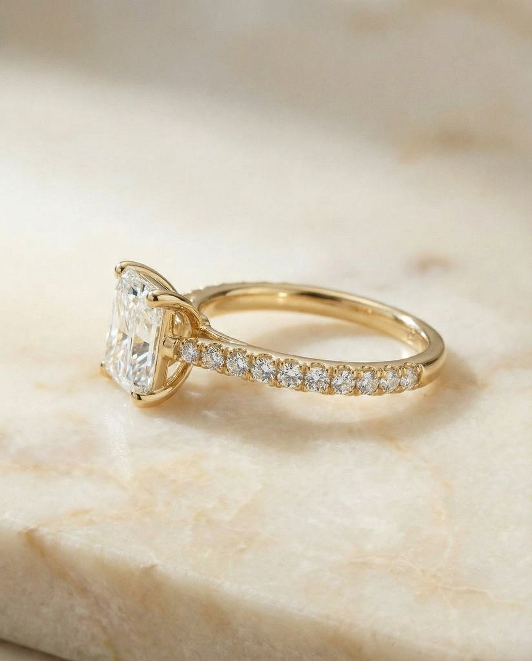 The Donna engagement ring setting in 18K Yellow Gold, cathedral french pavé solitaire cut design | RockHer