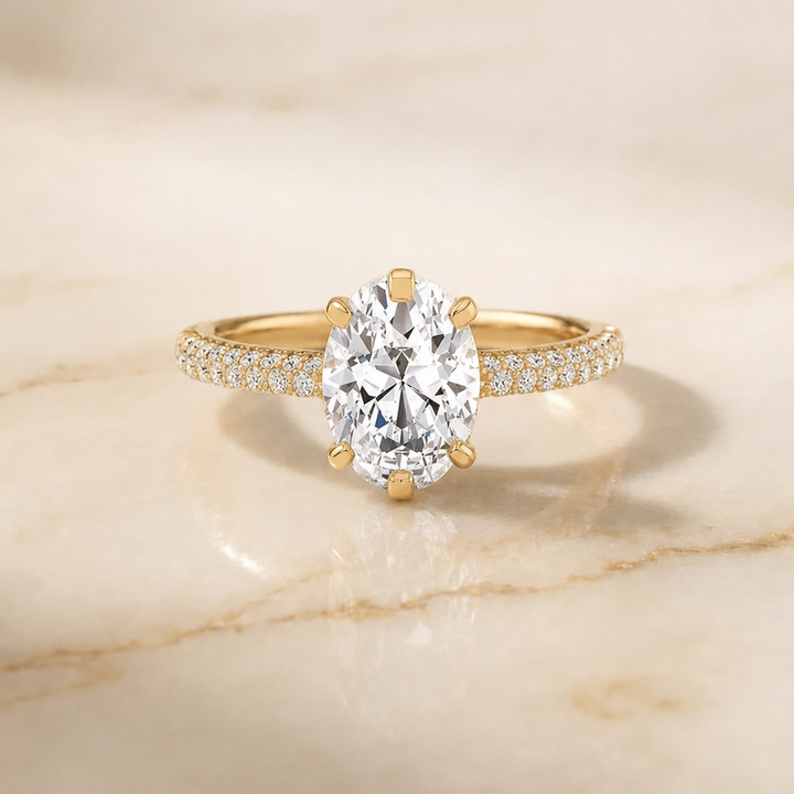 The Daisy Three Row French Pavé Oval Engagement Ring Setting in 18K Yellow Gold