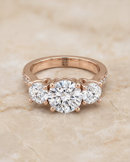 Avery Select Channel Pavé Three Stone Round Lab Diamond Engagement Ring in 14K Rose Gold, alternate angle | RockHer