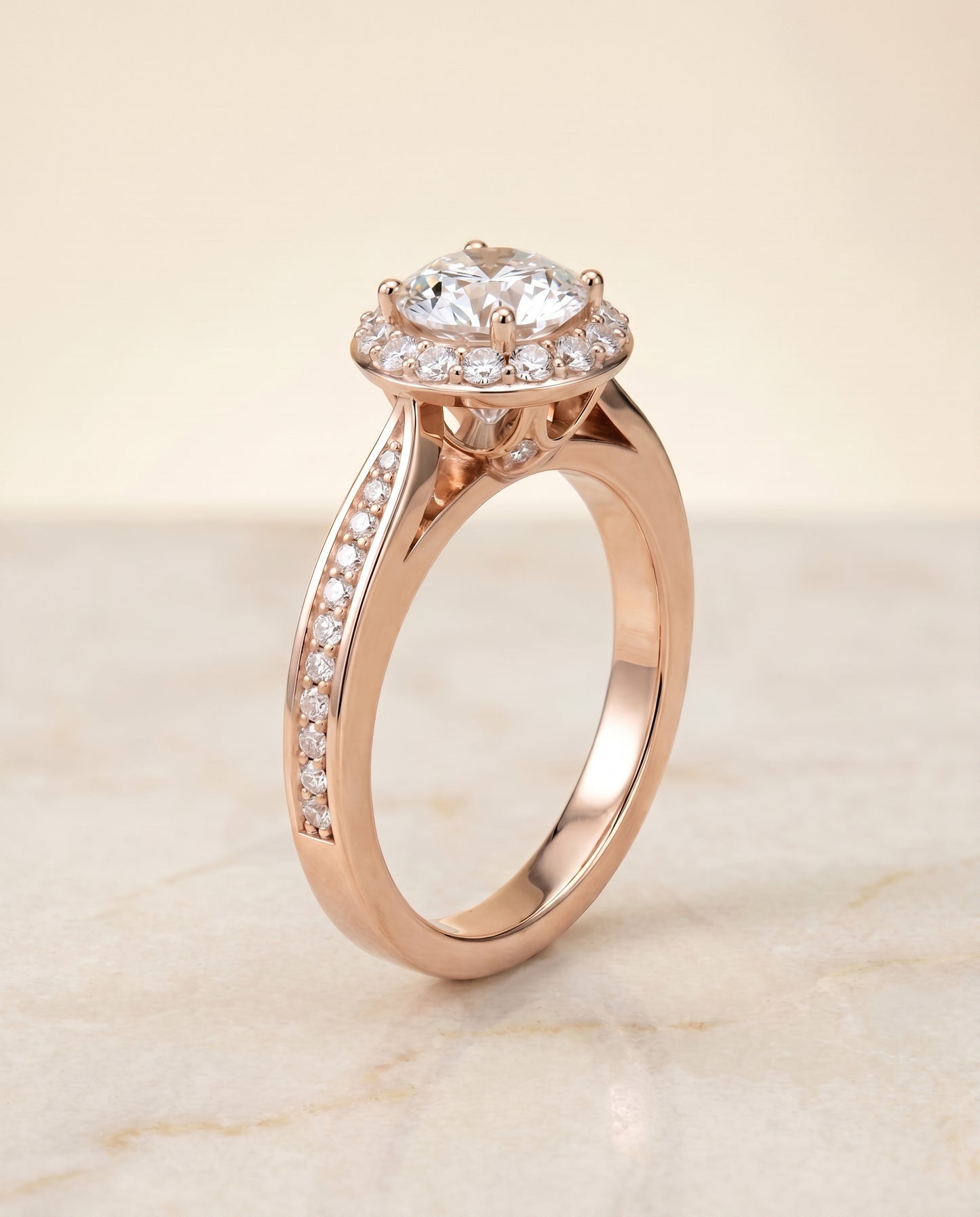 Round Brilliant, Channel Row Pavé Halo, in 14K Rose Gold, prong setting – front view | RockHer