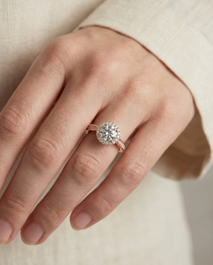 Round Brilliant, Channel Row Pavé Halo, in 14K Rose Gold, prong setting – lifestyle shot | RockHer