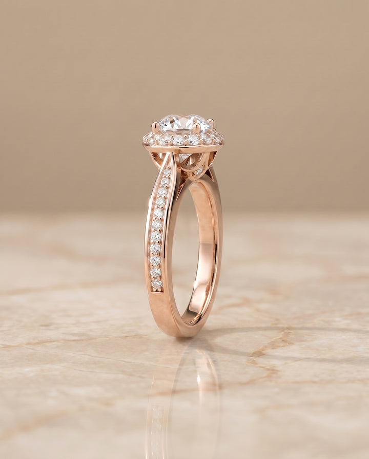 Round Brilliant, Channel Row Pavé Halo, in 14K Rose Gold, prong setting – side profile | RockHer