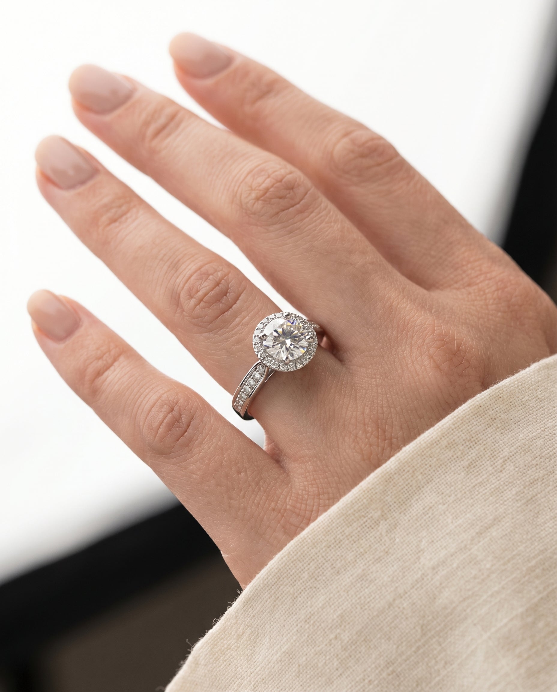 The Aria engagement ring setting in 18K White Gold, channel row pavé halo design | RockHer