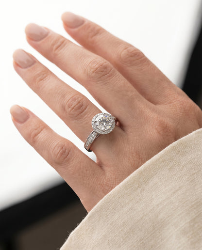 Round Brilliant, Channel Row Pavé Halo, in 18K White Gold, prong setting – lifestyle shot | RockHer