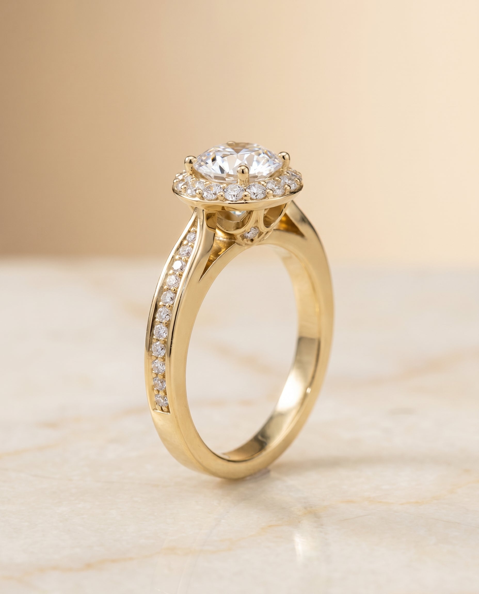 Channel Row Pavé Halo styling on The Aria round engagement ring setting | RockHer
