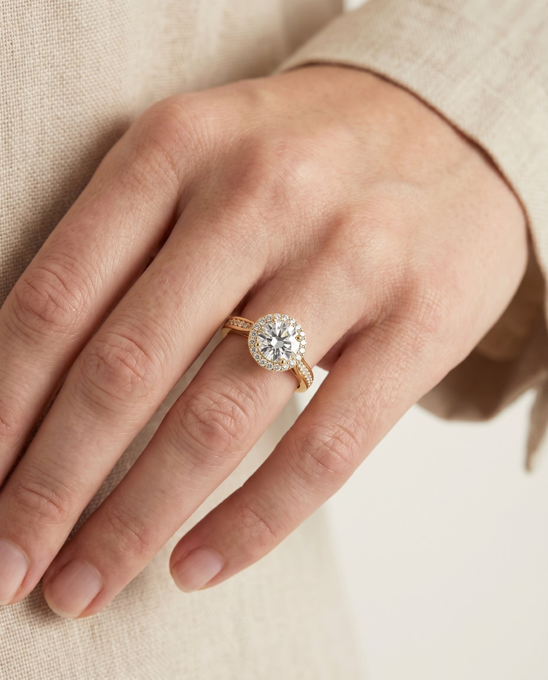 The Aria engagement ring setting in 18K Yellow Gold, channel row pavé halo design | RockHer