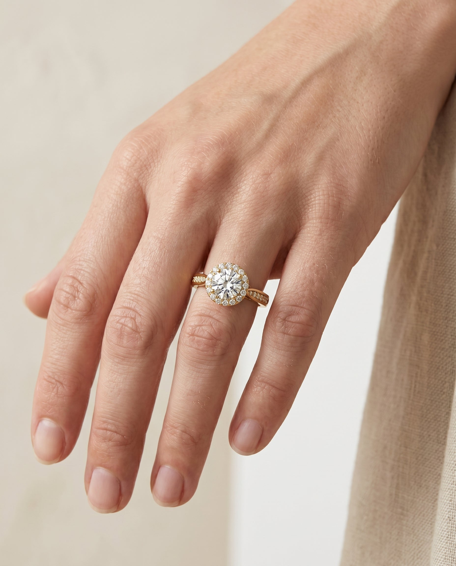 The Aria setting for round diamonds, made to order in 18K Yellow Gold | RockHer